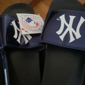 Never worn Yankees sandals.